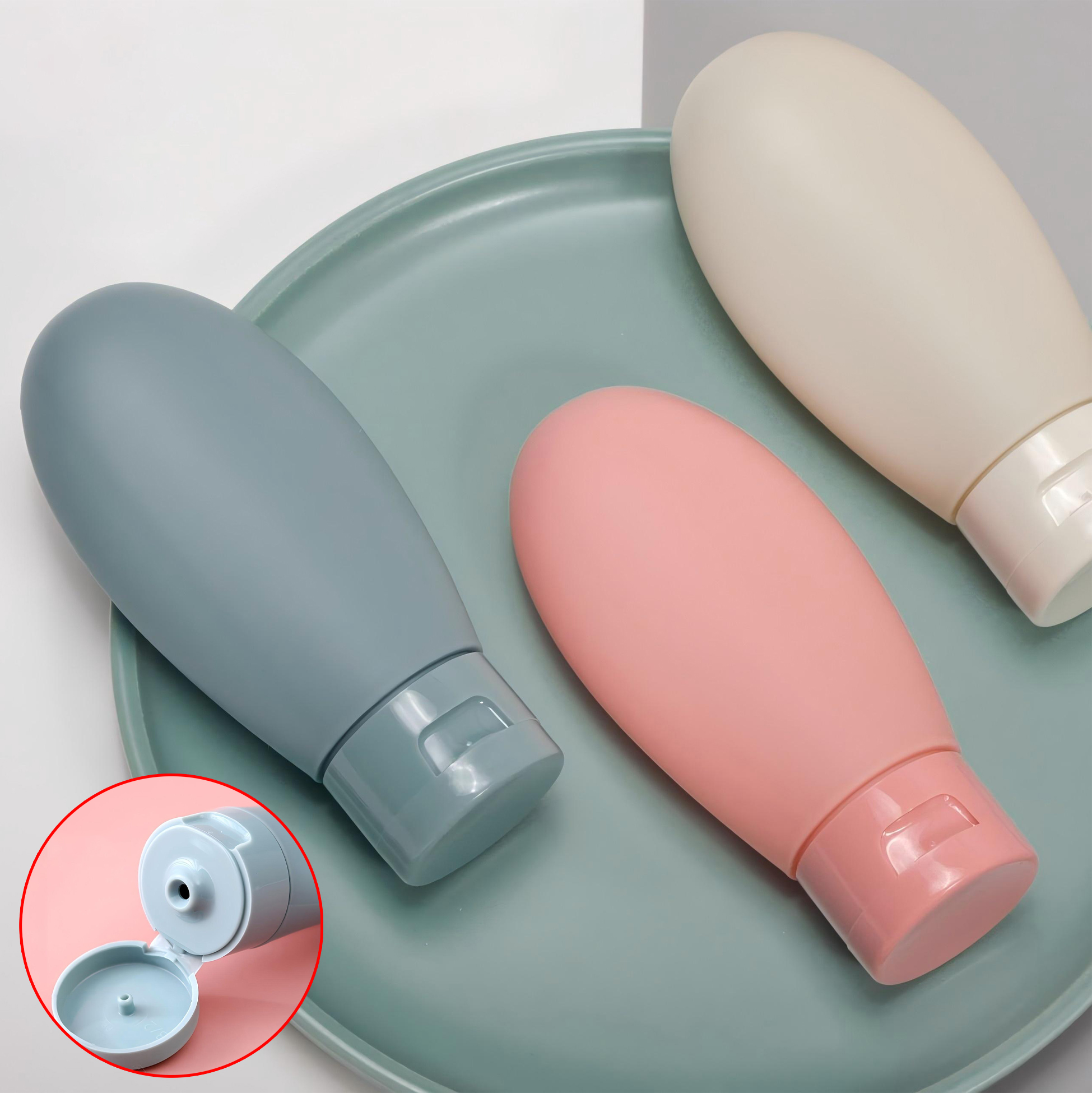 4 Piece Set of Travel Sized Squeezable Cosmetic Bottles
