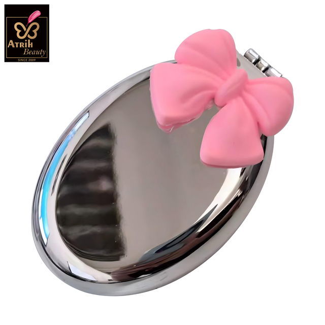 Oval Compact Mirror with Integrated Brush
