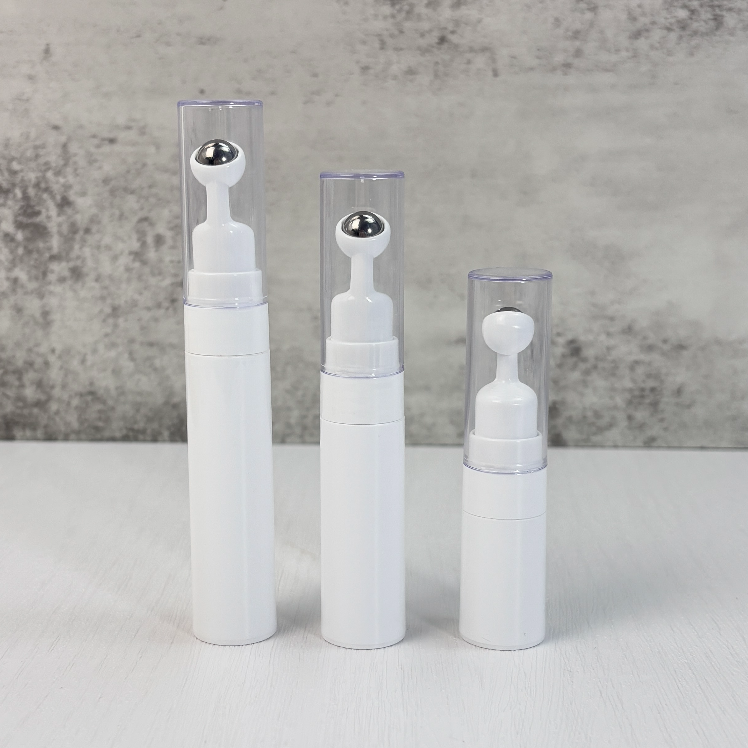 White Roller-Ball Eye Cream Massage Bottles