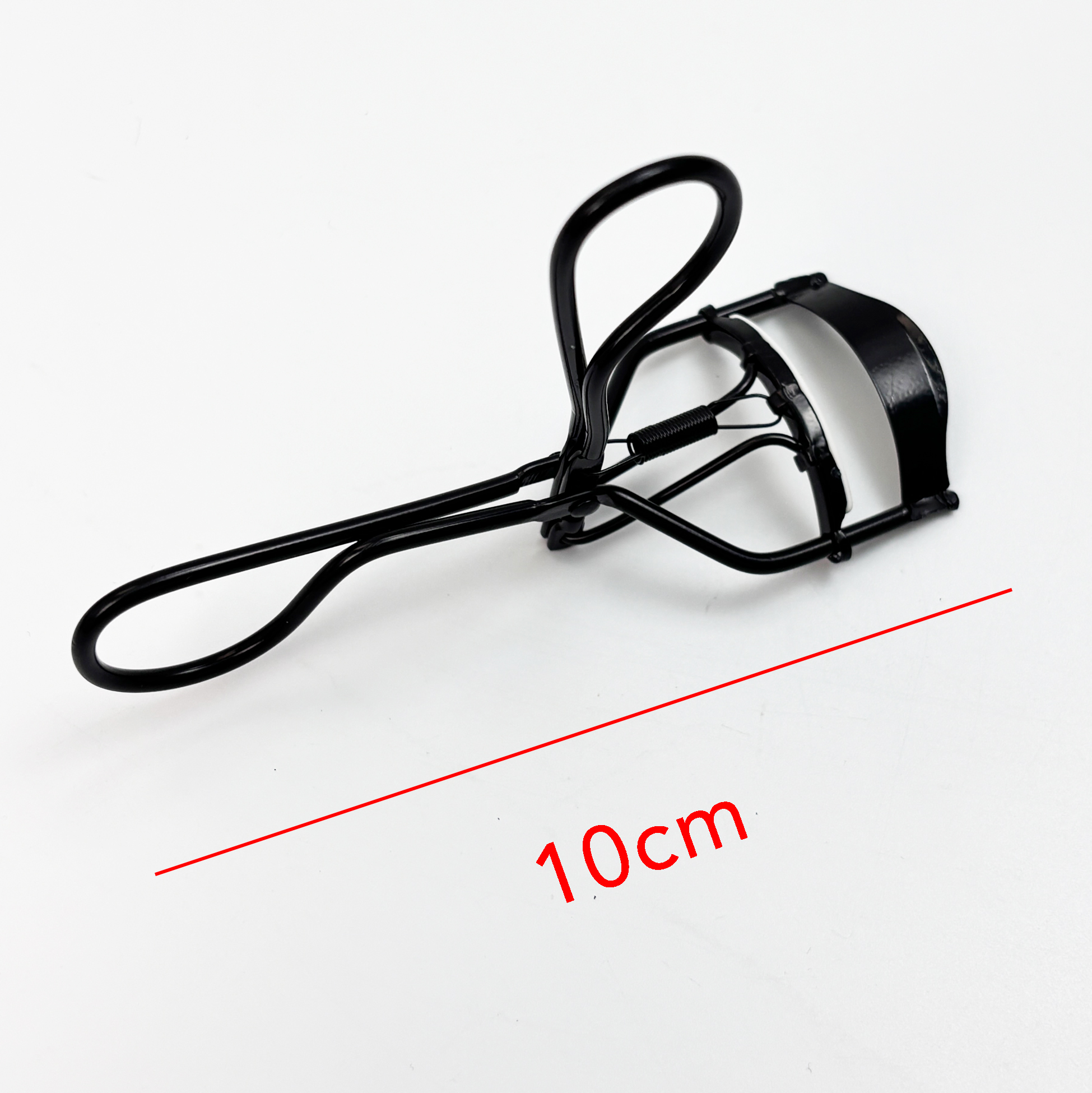 Spring-Loaded Eyelash Curler